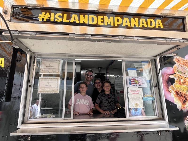 Check out your photos at our event at Island Empanada on June 2nd.