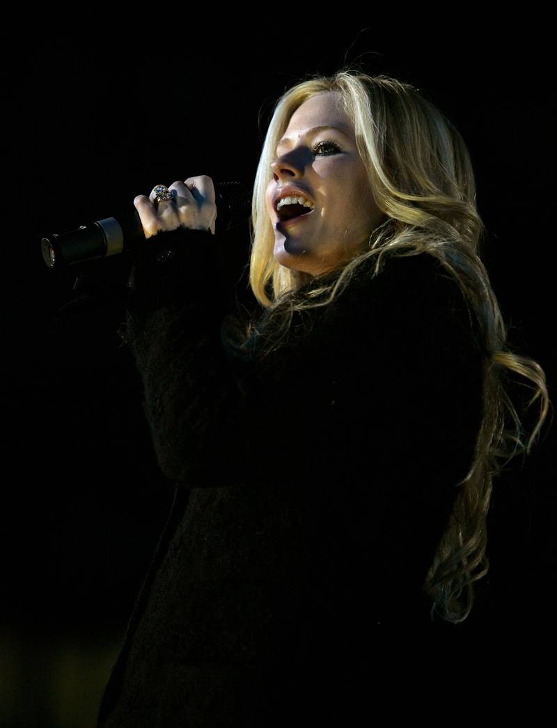 Canadian singer Avril Lavigne performs during the Closing Ceremony of the Turin 2006 Winter Olympic Games on February 26, 2006 at the Olympic Stadium in Turin, Italy.  (Photo by Elsa/Getty Images)