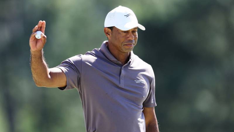 AUGUSTA, GEORGIA - APRIL 12: Tiger Woods of the United States reacts on the 18th green during the second round of the 2024 Masters Tournament at Augusta National Golf Club on April 12, 2024 in Augusta, Georgia. (Photo by Warren Little/Getty Images)