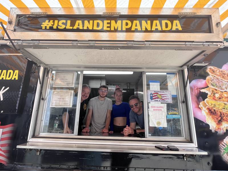 Check out your photos at our event at Island Empanada on June 2nd.