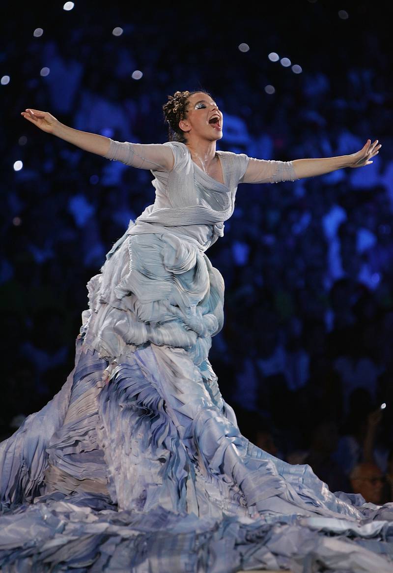 Icelandic artist Bjork sings during the opening ceremony of the Athens 2004 Summer Olympic Games on August 13, 2004 at the Sports Complex Olympic Stadium in Athens, Greece. (Photo by Michael Steele/Getty Images)