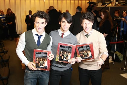 November 28, 2008: Kevin Jonas, Joe Jonas and Nick Jonas sign copies of ''Burning Up: On Tour with the Jonas Brothers'' in New York City.
