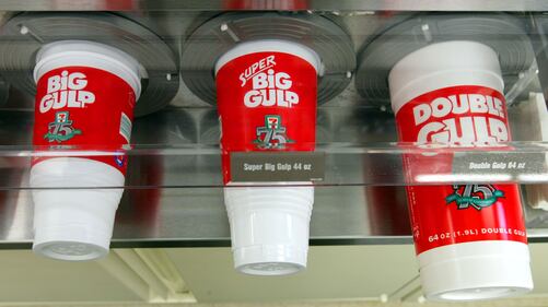 7-Eleven's famous Big Gulp, Super Big Gulp and Double Big Gulp cups observing its 75th anniversary in 2002.  (Photo by Joe Raedle/Getty Images)