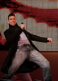 Singer Ricky Martin performs in concert after the Medal Ceremony at the Medals Plaza on Day 12 of the Turin 2006 Winter Olympic Games, February 22, 2006 in Turin, Italy.  (Photo by Stephen Munday/Getty Images)