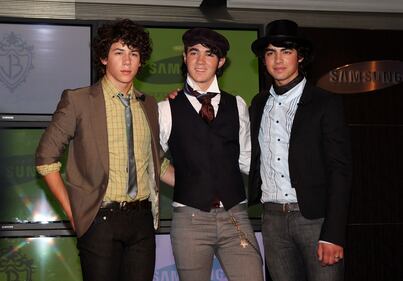 July 18, 2007: Musicians Nick Jonas, Kevin Jonas and Joe Jonas of The Jonas Brothers pose for a photo during a press conference for the upcoming release of their new CDVU+ album.