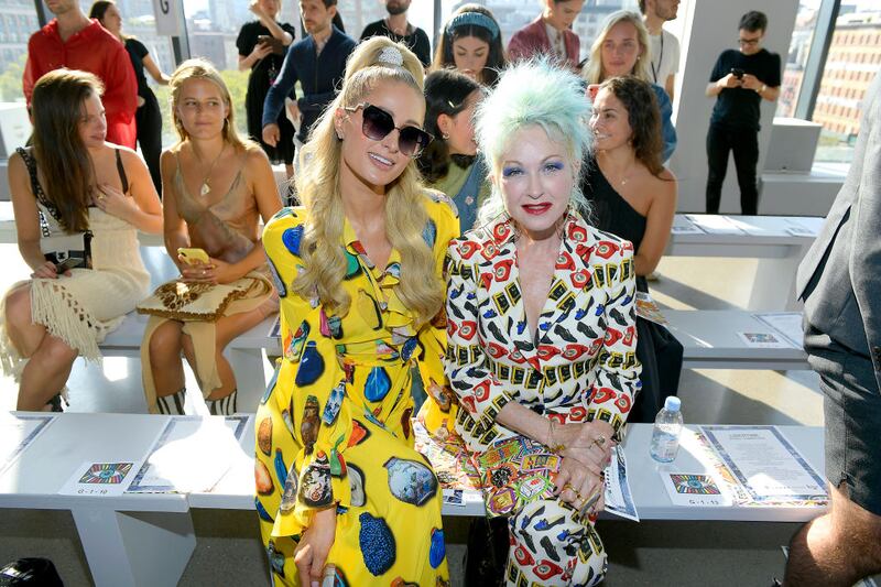 NEW YORK, NEW YORK - SEPTEMBER 11: (L-R) Paris Hilton and Cyndi Lauper attend Libertine fashion show during New York Fashion Week: The Shows at Gallery II at Spring Studios on September 11, 2019 in New York City. (Photo by Roy Rochlin/Getty Images)