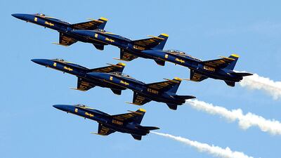 SAN FRANCISCO - OCTOBER 11: U.S. Navy Blue Angels F-18A Hornets fly in formation during a practice performance for Fleet Week October 11, 2002 in San Francisco, California. The annual Fleet Week event includes an air show by the Blue Angels, a parade of military ships and tours of U.S. Navy ships. (Photo by Justin Sullivan/Getty Images)